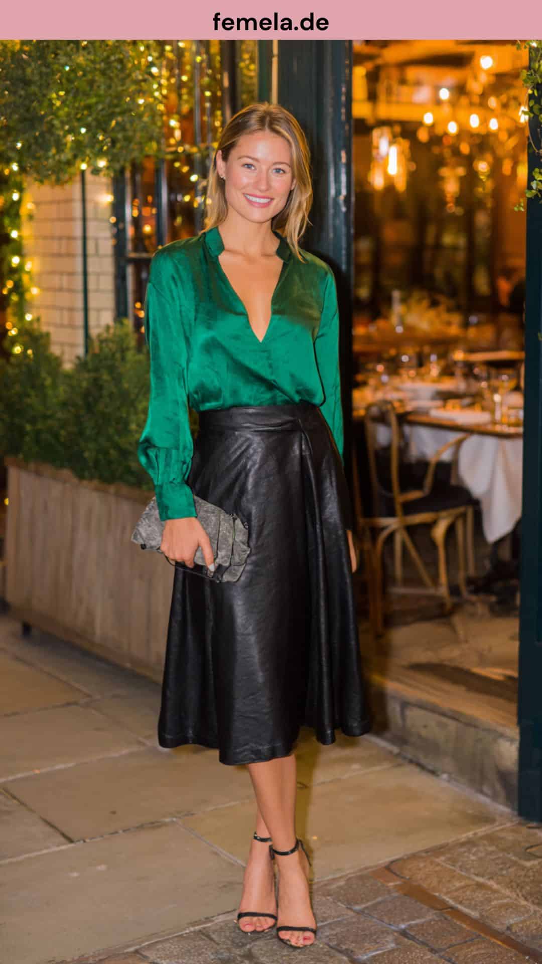 Edles Abend-Outfit mit smaragdgrüner Satinbluse und schwarzem Midi-Lederrock